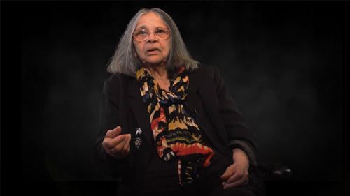 Aunty Tina Wright in profile discusses her history of fighting for land rights